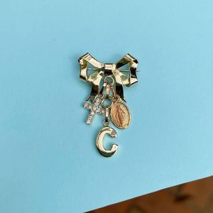 Charm brooch